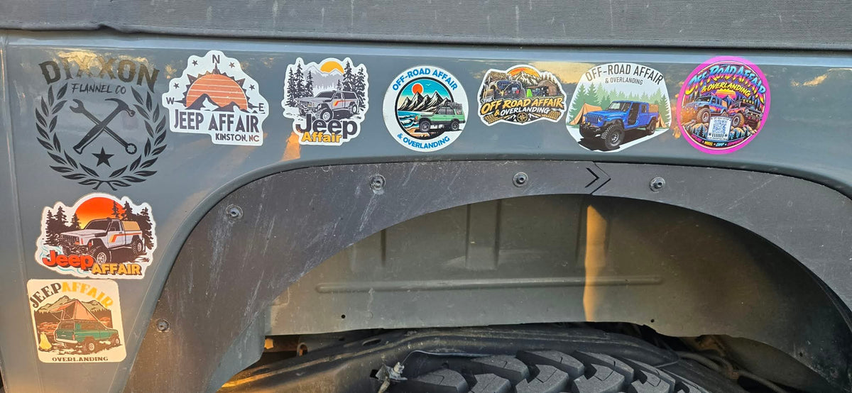 Off-Road Affair and Jeep Affair event stickers on a Jeep fender